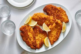 breaded chicken breasts on a serving platter