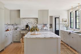 marble counter top and backsplash neutral color kitchen