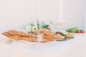 wedding buffet table with my fair lady quote on sign