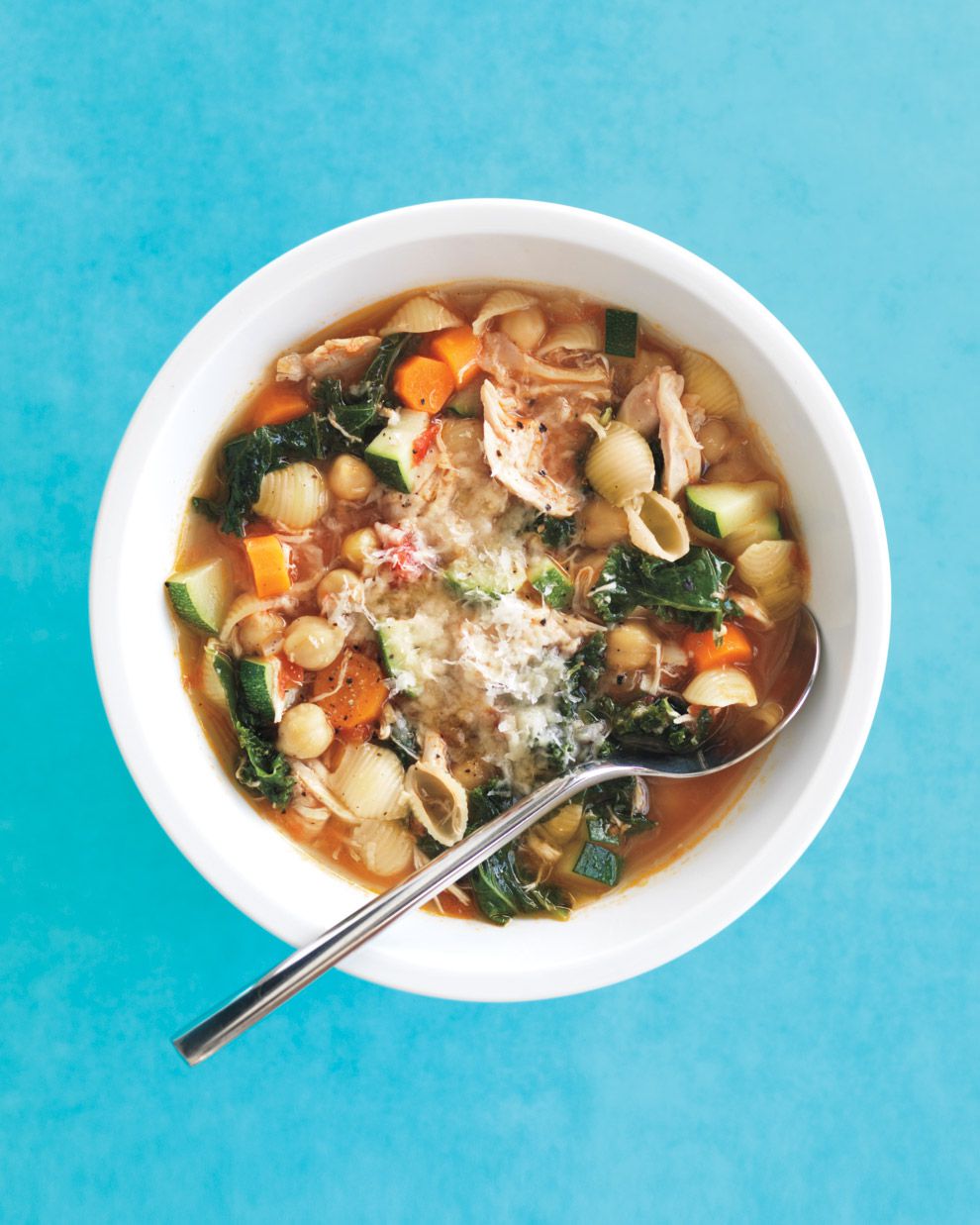 Italian chicken minestrone soup in white bowl