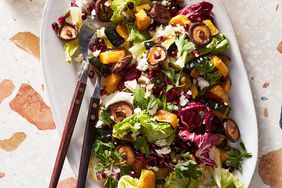 chopped winter salad with mushrooms and pomegranate