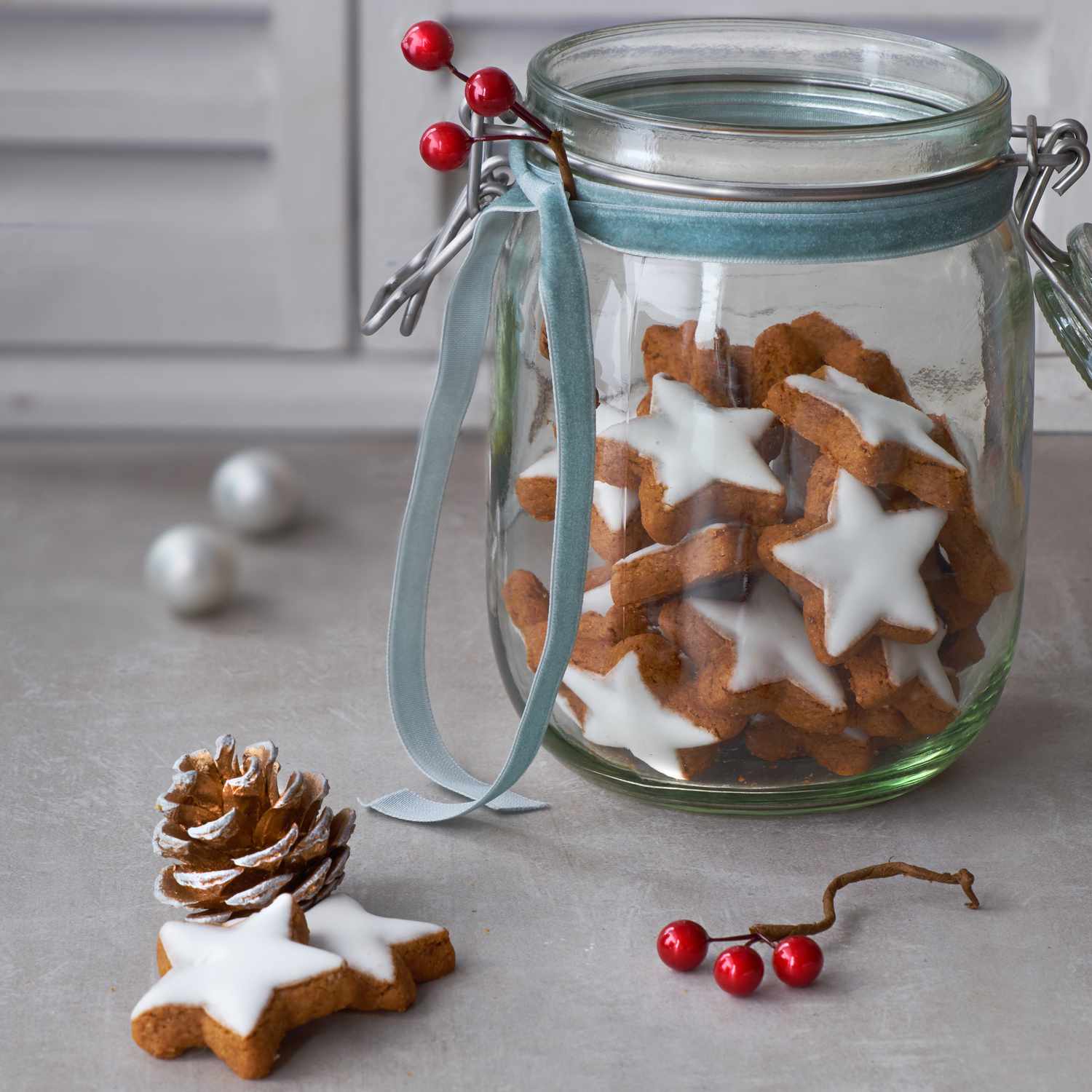 Christmas background with tasty star ginger cookies in a glass j