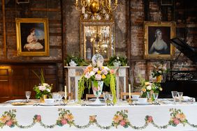 A table setting with a floral tablecloth