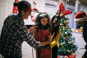 People playing a game at a Christmas party