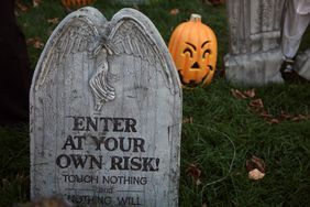 Tombstone Halloween decorations on a lawn. 