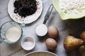 measuring cups on a baking counter