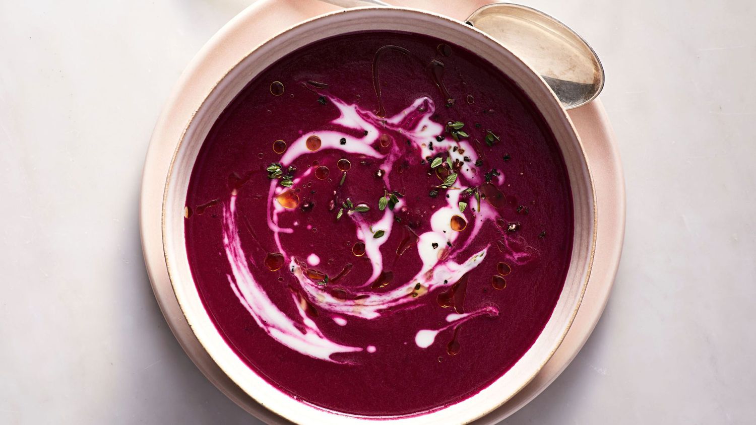 gingery beet soup in ceramic bowl