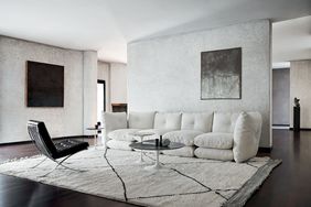 A white room with a white sofa 