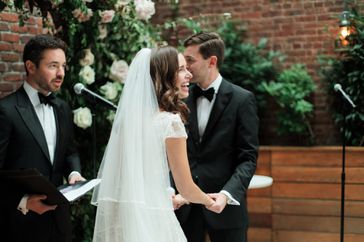 bride and groom exchanging wedding vows