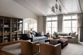 Living room with two sofas and leather chairs