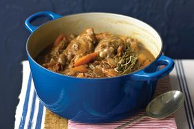 wine braised chicken in a blue Dutch oven