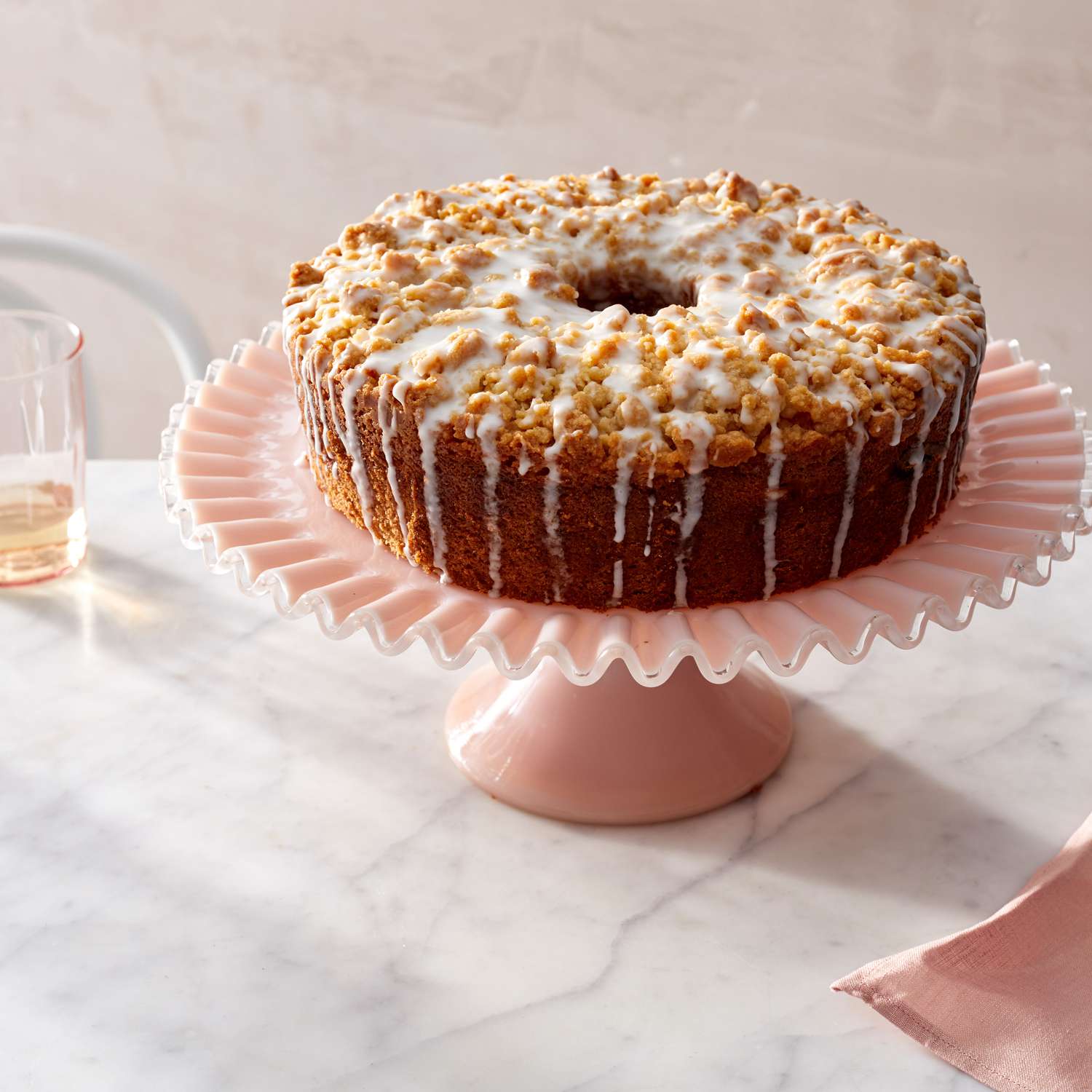 meyer lemon coffee cake on pink stand