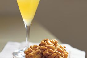 glass of limoncello and cookies