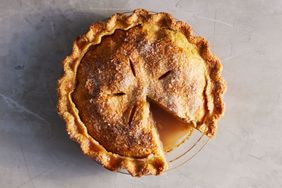 best apple pie recipe with slice cut out on grey countertop