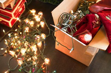 Christmas lights in cardboard box