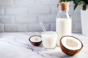 Cream of coconut and coconut milk in jars