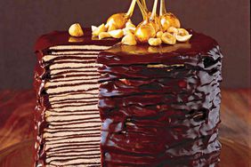 chocolate crepe cake with candied hazelnts on top