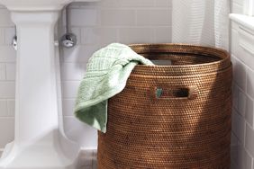 Bathroom towels in laundry basket