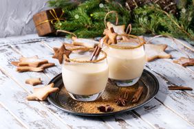 Eggnog served in two glasses on a tray 