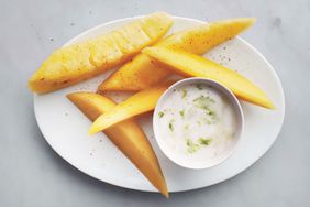 Mango fruit with yogurt dip