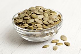 pumpkin seeds in a glass bowl