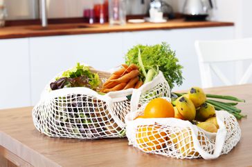 Produce on counter in reusable bags