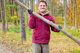 Ryan McCallister, gardener with large branch