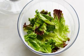 overhead view of lettuce in a salad spinner