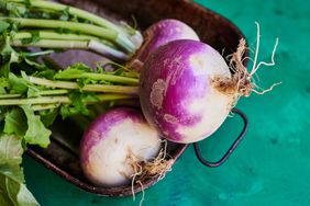 Purple turnips in metal dish