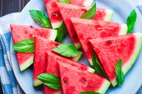 watermelon slices with seeds on a plate