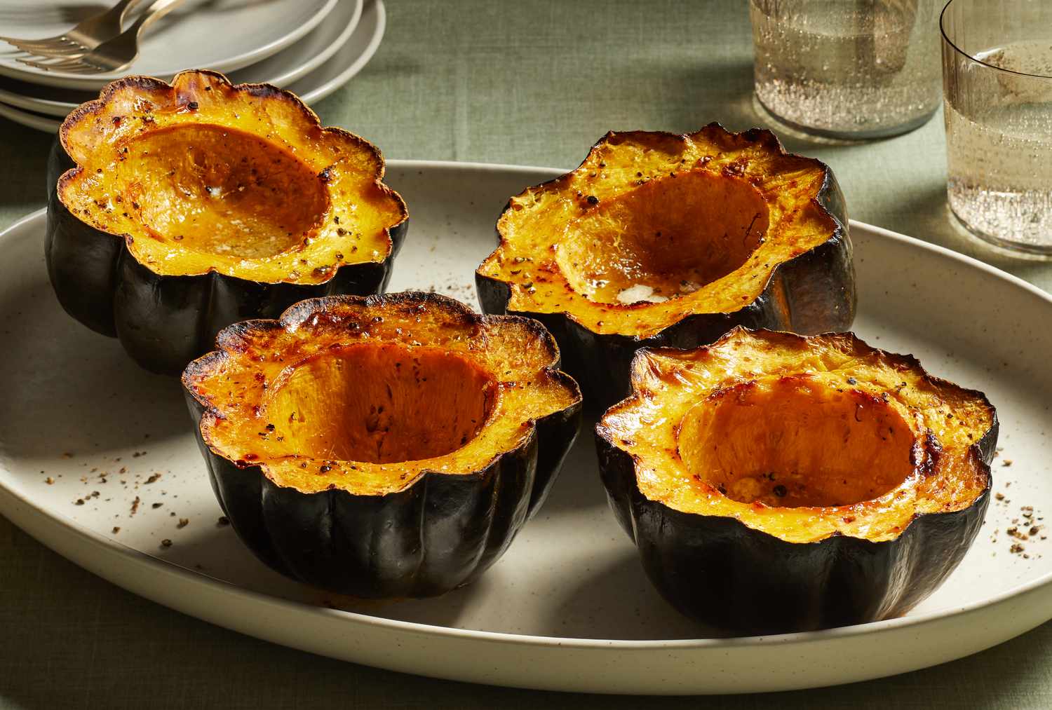 cooked acorn squash on a platter