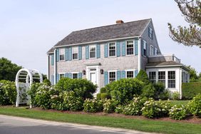 exterior of two-story nantucket beach house