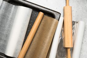 aluminium foil, parchment paper, baking paper on counter