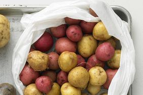 sack of new potatoes on baking sheet