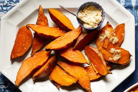 slow-baked sweet potatoes served on a white plate