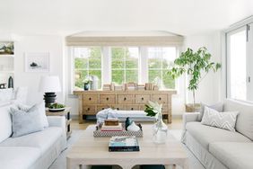 light hued color scheme large coffee table between couches