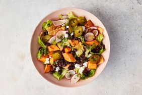 sweet potato taco salad served in pink bowl