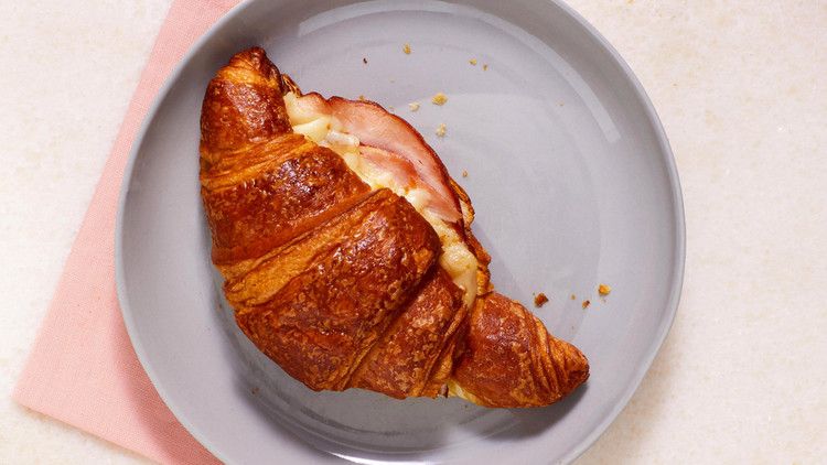 twice-baked ham croissant served on a gray plate