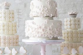 dessert table with wedding cake and macaron cakes