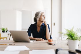 woman working at desk at home