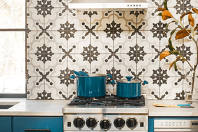 Stove top with blue pots and pans